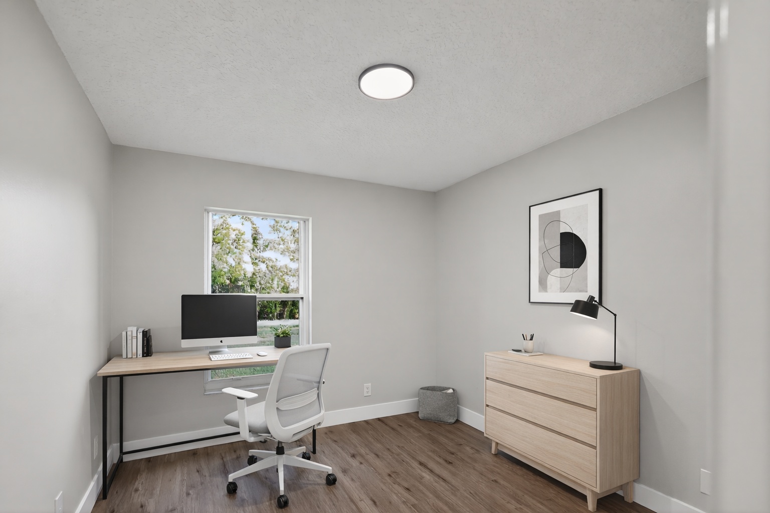 Apartment flex room after AI virtual staging as a home office