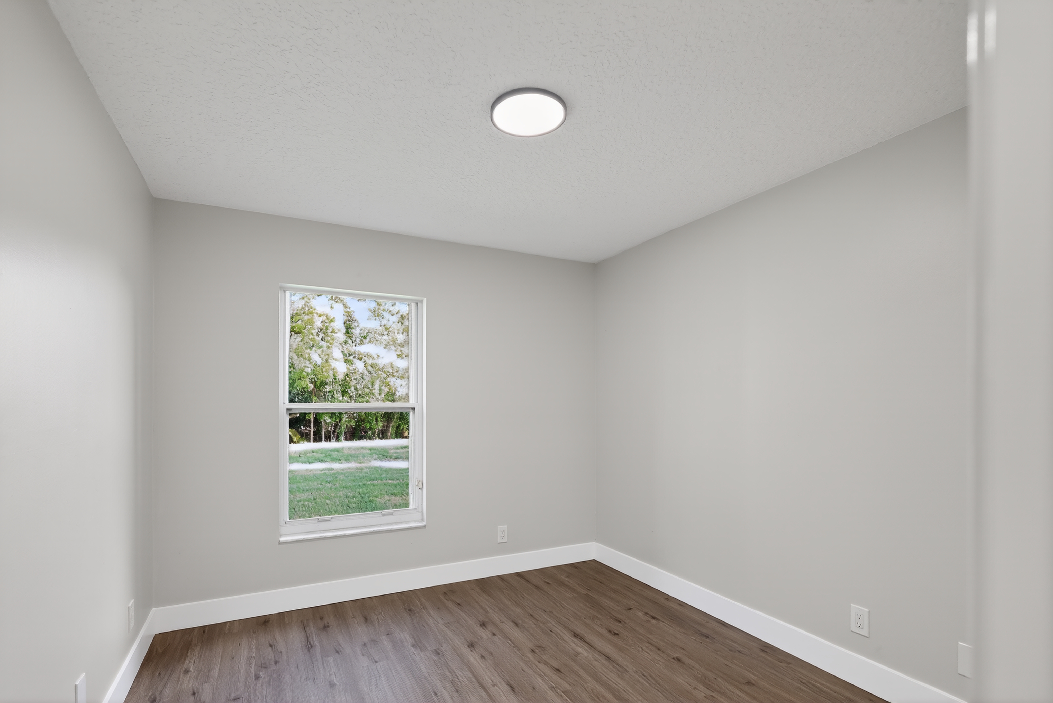 Empty apartment flex room before AI virtual staging